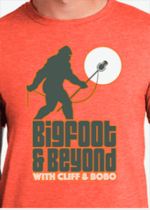 a peach Bigfoot & Beyond shirt